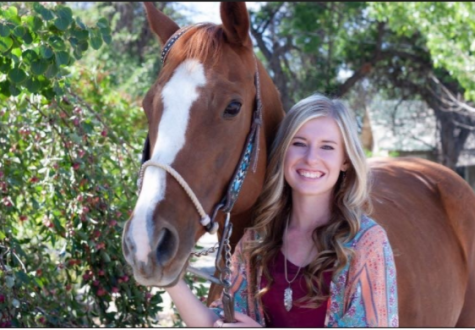 Senior at Delta High School, Kaitlyn Sharpe, poses with her horse Pica during senior photos. 


