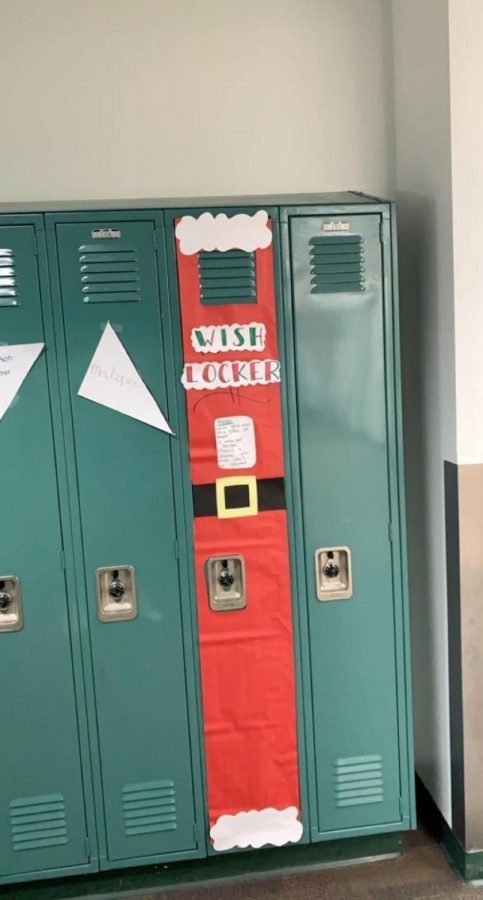 Sweetest Gift- Juniors Baili Hulet, Oaklee Hughes, Melana McCormick, Mia Yost, and Raelee Mccurdy had fun decorating the wish locker. This years theme was a Santa Claus suit. 