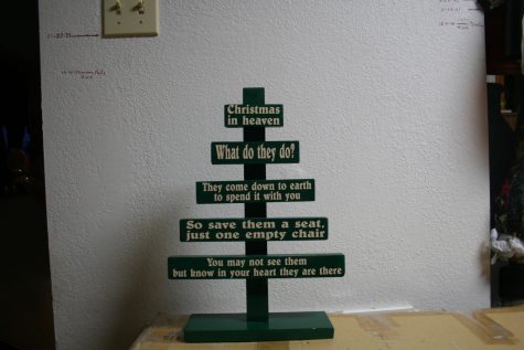 This little Christmas tree was inspired by Pinterest. The idea behind it is to make a new tradition at the holidays. Just to leave an empty chair for a loved one who has died.