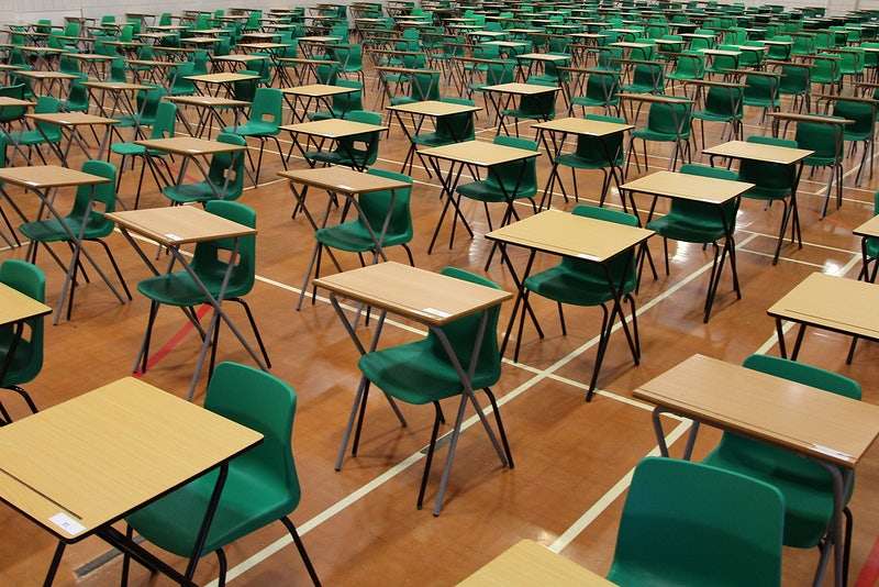 Exam+hall+with+tables+and+chairs.+Original+public+domain+image+from+Flickr