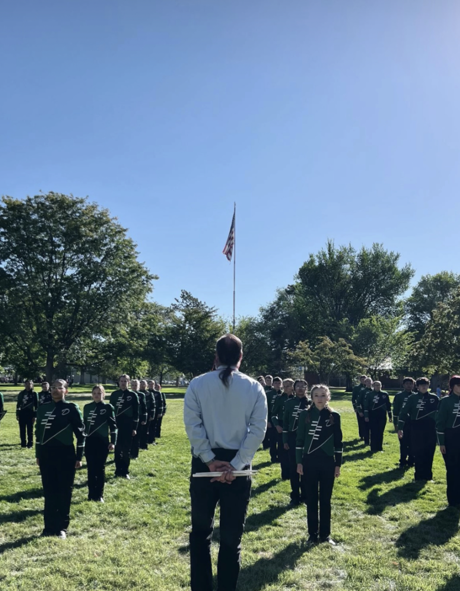 The Delta High School marching band warms up before Colorado West Marching Invitational in Grand Junction.
