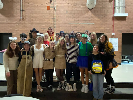  NHS members pose for a picture after Halloween High. All these students dressed up in fun costumes to make this night more exciting for the younger kids. “We had some new activities this year and I think that helped so they had some new stuff to do for that hour and a half,” senior Brianna Huff said. 
