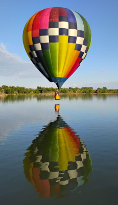 Xcess balloon doing a ‘splash down’ in the Confluence lake last festival

